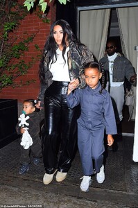 19089632-7519025-Camo_fashion_Kardashian_West_looked_stylish_in_black_leather_pan-a-14_1569807729619.jpg