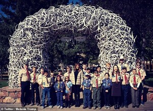 19300362-7536931-The_first_lady_poses_with_boy_scouts_beneath_the_elk_arch_made_o-a-28_1570205875435.jpg