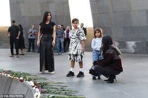 19453304-7551035-Poignant_The_family_took_several_moments_in_silence_at_the_memor-a-61_1570591881227.jpg