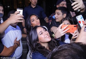 19453624-7551035-Pout_She_was_swarmed_by_fans_who_desperately_wanted_her_photo_wi-a-71_1570591882439.jpg