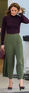 19488286-7553831-The_royal_could_be_seen_tucking_her_hair_behind_her_ears_as_it_b-a-47_1570650029101.jpg
