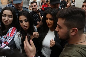 19503694-7555629-Chaos_Kim_s_visit_has_caused_quite_the_stir_in_Armenia_as_many_f-a-2_1570647586608.jpg