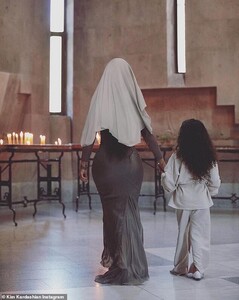 19703928-7572195-Important_day_On_Friday_Kim_revealed_she_was_baptized_along_with-a-44_1571079790355.jpg