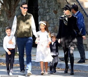 19704508-7572359-Off_they_go_Ivanka_Trump_and_Jared_Kushner_were_seen_walking_to_-a-99_1571079176590.jpg