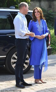 19725030-7573891-The_couple_are_visiting_the_Islamabad_Model_College_for_Girls_in-a-41_1571118482011.jpg