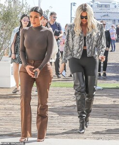 19766778-7577841-Sister_bonding_Kim_Kardashian_West_served_body_in_a_skintight_lo-a-3_1571192954919.jpg