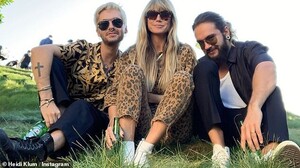 19947320-7592901-Loving_life_Klum_was_joined_by_a_pal_and_husband_Tom_Kaulitz_R_f-a-59_1571550404177.jpg