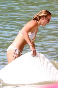 caroline-wozniacki-slips-into-a-white-bikini-while-enjoying-a-beach-day-with-husband-david-lee-in-barbados-281019_24.jpg