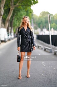 chloe-lecareux-wears-a-black-leather-dress-a-bag-outside-the-party-picture-id1166012924.jpg