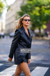 chloe-lecareux-wears-bejeweled-sunglasses-a-black-leather-jacket-picture-id1177508803.jpg