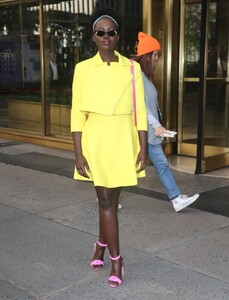 lupita-nyong-o-in-a-matching-canary-yellow-skirt-set-10-15-2019-4.jpg