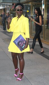 lupita-nyong-o-in-a-matching-canary-yellow-skirt-set-10-15-2019-6.jpg