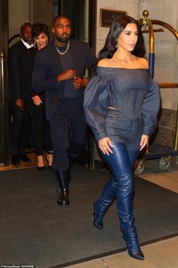 20703480-7658775-Make_way_The_famous_family_were_seen_striding_outside_of_a_build-a-22_1573103603653.jpg