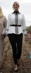 20717324-7660521-On_the_ground_Ivanka_was_given_a_guided_tour_of_an_olive_grove_c-m-63_1573148522713.jpg