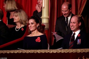 20809436-7668377-Prince_William_and_Kate_smile_as_they_attend_the_Royal_British_L-a-39_1573355400615.jpg