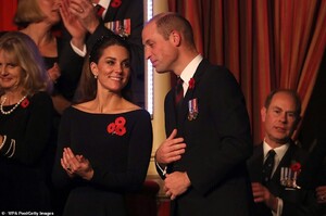 20809528-7668377-Kate_smiles_at_husband_William_as_the_pair_attend_the_annual_Roy-a-36_1573355400270.jpg