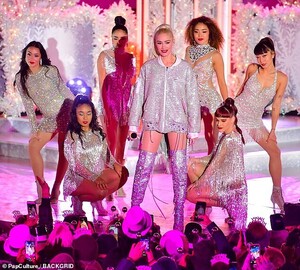 21035018-7687693-There_s_a_theme_The_backup_dancers_also_wore_similar_silver_ense-a-47_1573788395014.jpg