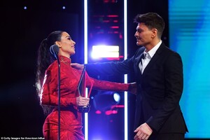 21187170-7700507-Sweet_moment_Mario_was_visibly_emotional_as_she_introduced_him_a-a-50_1574148600456.jpg