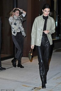 21228546-7704269-Time_to_leave_Kendall_walked_in_front_of_Gigi_as_they_left_her_a-a-5_1574216624172.jpg