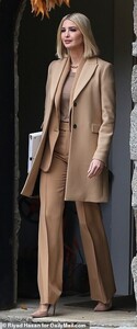 21253618-7707193-Style_Ivanka_donned_a_tan_suit_with_pleated_dress_pants_and_a_ma-a-2_1574273148094.jpg