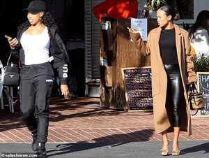 21380132-7718215-Girl_time_Karrueche_and_her_friend_were_spotted_making_casual_co-a-22_1574539244803.jpg