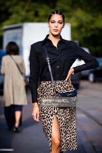 iris-mittenaere-wearing-a-black-shirt-and-animalier-skirt-is-seen-picture-id1176169950.jpg