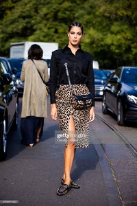 iris-mittenaere-wearing-a-black-shirt-and-animalier-skirt-is-seen-picture-id1176171527.jpg