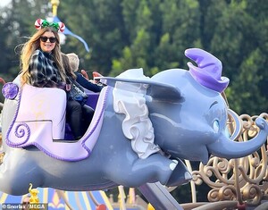 21009624-7686321-You_ll_believe_an_elephant_can_fly_The_couple_enjoyed_the_Dumbo_-m-1_1573752410357.jpg