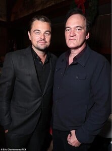 21755098-7750787-Looking_sharp_Leonardo_DiCaprio_and_film_director_Quentin_Tarant-a-2_1575379477466.jpg