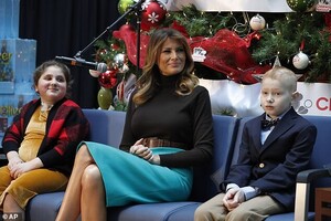 21923370-7765237-Sharing_the_stage_The_mother_of_one_listened_attentively_as_she_-a-128_1575674919278.jpg