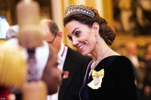 22122840-7781543-The_Duchess_of_Cambridge_looked_stunning_in_the_Lover_s_Knot_Tia-a-2_1576144310194.jpg