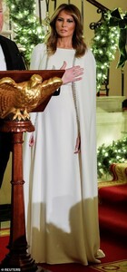 22184414-7787829-President_Donald_Trump_with_first_lady_Melania_Trump_walk_from_t-a-59_1576225579532.jpg
