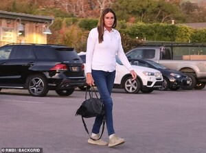 22228698-7791735-Evening_look_The_former_Olympic_gold_medalist_wore_a_sporty_whit-a-5_1576307078821.jpg
