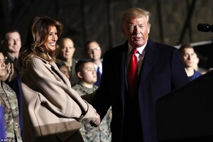 22517882-7815917-The_president_and_first_lady_arrived_at_Joint_Base_Andrews_in_Ma-a-16_1576892745899.jpg