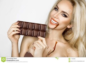 beautiful-sexy-blonde-women-green-eyes-sensually-eating-tasty-chocolate-woman-model-111920886.jpg