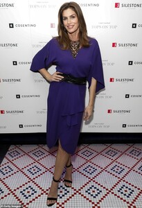 cindy-crawford-looks-regal-in-royal-purple-as-she-attends-the-tops-on-tops-event-in-houston.jpg