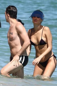 isabeli-fontana-rocks-a-black-bikini-while-enjoying-the-beach-with-husband-di-ferrero-in-south-beach-florida-221019_3.jpg
