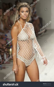 stock-photo-a-model-walks-the-runway-for-anna-kosturova-fashion-show-during-funkshion-swim-summer-on-july-477437191.jpg