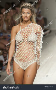 stock-photo-a-model-walks-the-runway-for-anna-kosturova-fashion-show-during-funkshion-swim-summer-on-july-477437245.jpg