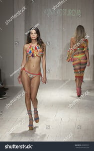 stock-photo-a-model-walks-the-runway-for-anna-kosturova-fashion-show-during-funkshion-swim-summer-on-july-490855501.jpg