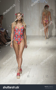 stock-photo-a-model-walks-the-runway-for-kai-lani-fashion-show-during-funkshion-swim-summer-on-july-476088193.jpg