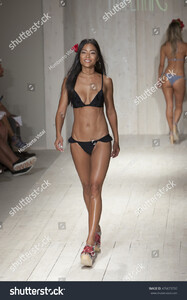 stock-photo-a-model-walks-the-runway-for-kai-lani-fashion-show-during-funkshion-swim-summer-on-july-476673793.jpg