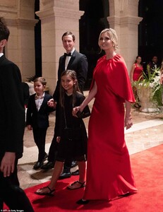 22863270-7842181-Ivanka_Trump_walked_into_the_party_holding_the_hang_of_her_daugh-m-23_1577913241202.jpg