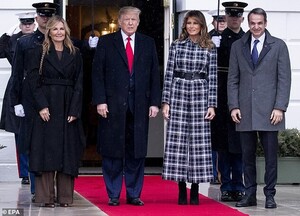 23123812-7862335-Center_of_attention_Melania_and_Trump_stood_between_their_guests-a-30_1578454905208.jpg