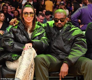 23406982-7888181-Famous_Kim_and_Kanye_took_in_the_weeknight_game_as_the_Lakers_ro-a-4_1579056346736.jpg