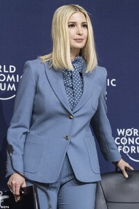 23724338-7916199-Feeling_blue_Ivanka_donned_a_pantsuit_and_a_polka_dot_shirt_to_a-a-24_1579742488159.jpg