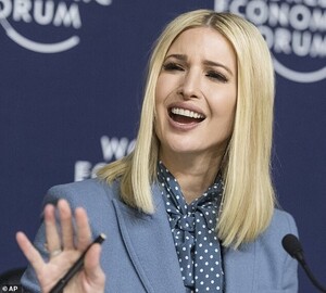 23724352-7916199-Putting_on_a_brave_face_Ivanka_s_attendance_at_the_press_confere-a-23_1579742488141.jpg