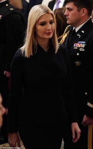 23995186-7939473-Worried_The_first_daughter_had_a_somber_look_on_her_face_as_she_-m-30_1580245469883.jpg