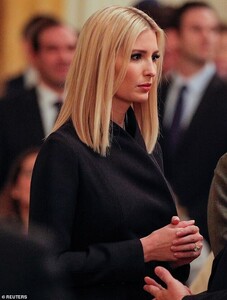 23995190-7943725-Focused_Ivanka_had_a_serious_look_on_her_face_and_her_hands_clas-a-29_1580320903940.jpg