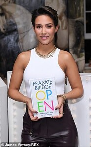 23949998-7935519-Pose_The_brunette_beauty_proudly_posed_with_a_copy_of_her_book_i-a-82_1580163580954.jpg